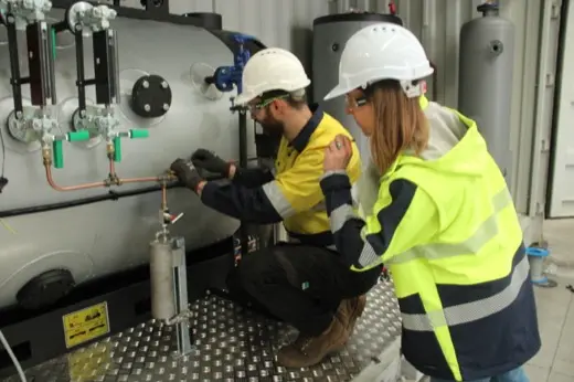Technicians servicing an industrial boiler during O'Brien training