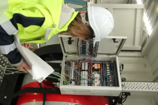Trainee studying the boiler electrical schematic